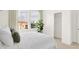 Bright bedroom with view, neutral carpet, and closet at 8781 Marietta Ln, McCordsville, IN 46055