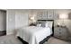 Calming bedroom with natural light, neutral walls, carpet, and a comfortable bed at 8856 Alexander Ridge Dr, McCordsville, IN 46055