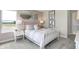 Stylish bedroom with three large windows, stylish mirrors, and neutral decor at 8856 Alexander Ridge Dr, McCordsville, IN 46055