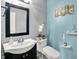 Chic bathroom features stylish vanity, sleek fixtures, and contemporary design at 9001 Harrison Run Ct, Indianapolis, IN 46256