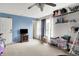 Sunlit bedroom featuring classic furniture, natural light, and playful decor accents at 9001 Harrison Run Ct, Indianapolis, IN 46256