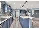 Stylish kitchen boasts modern cabinets, marble countertops, and stainless steel appliances at 9001 Harrison Run Ct, Indianapolis, IN 46256