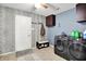 Well-equipped laundry room includes modern washer/dryer, storage cabinets, and a folding area at 9001 Harrison Run Ct, Indianapolis, IN 46256