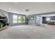 Expansive living area featuring an open layout, seamlessly connecting to the kitchen and dining spaces at 9001 Harrison Run Ct, Indianapolis, IN 46256
