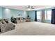 Bright living room featuring neutral colors, plush seating, and abundant natural light at 9001 Harrison Run Ct, Indianapolis, IN 46256