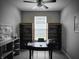 Office space with a ceiling fan, and built-in bookcase shelving at 9106 Hedley E Way, Avon, IN 46123