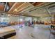 Unfinished basement with exposed ceiling, ready to be transformed into a recreation or entertainment space at 9656 Summerton Dr, Fishers, IN 46037