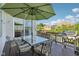 Outdoor deck with a glass table and grill, offering a great view and perfect space for outdoor gatherings at 9656 Summerton Dr, Fishers, IN 46037