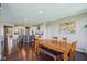Spacious dining room leading to an open kitchen features hardwood floors and plenty of seating at 9656 Summerton Dr, Fishers, IN 46037