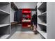 Walk-in closet offering ample shelving and hanging storage space for organization at 970 Fort Wayne Ave # 303, Indianapolis, IN 46202