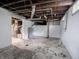 Spacious unfinished basement with exposed pipes, ductwork, and utilities, offering customization possibilities at 1065 36Th St, Indianapolis, IN 46208