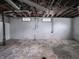 Unfinished basement with painted walls and exposed ductwork offers potential for customization and additional living space at 1065 36Th St, Indianapolis, IN 46208