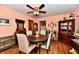 Traditional dining room with hardwood floors and vintage accents at 1106 W 4Th St, Anderson, IN 46016