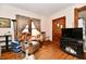 Cozy living room with hardwood floors, natural light, and comfortable seating at 1106 W 4Th St, Anderson, IN 46016