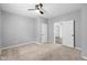 Bedroom with neutral paint, new carpet, natural light from the window, view of another room at 1216 N Ewing St, Indianapolis, IN 46201