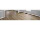 Living room with wood flooring and gray walls with white trim at 1216 N Ewing St, Indianapolis, IN 46201