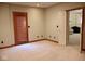 Finished basement showcasing a walk-out door to the exterior of the home at 14020 Brookstone Dr, Carmel, IN 46032