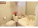 Charming powder room with elegant fixtures, a stylish mirror, and ample lighting, perfect for guests at 14020 Brookstone Dr, Carmel, IN 46032