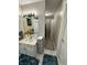 Bathroom with a long mirror and a walk-in closet at 14020 Brookstone Dr, Carmel, IN 46032