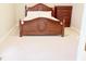 Bedroom with an elegant bed and dresser at 14020 Brookstone Dr, Carmel, IN 46032