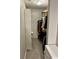 Walk-in closet with extensive clothing racks and storage at 14020 Brookstone Dr, Carmel, IN 46032