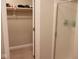 Walk-in closet featuring ample hanging storage space for clothes and accessories at 14020 Brookstone Dr, Carmel, IN 46032