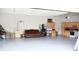 Spacious garage with cabinets, oven, and sofa at 14020 Brookstone Dr, Carmel, IN 46032