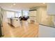 Spacious kitchen boasts stainless steel appliances, an island with barstool seating, and an open floor plan at 14020 Brookstone Dr, Carmel, IN 46032