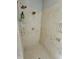 Modern walk-in shower with sleek design, marble-like tiles, and multiple shower heads for a spa-like experience at 14020 Brookstone Dr, Carmel, IN 46032