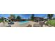 Spacious backyard with a sparkling swimming pool, ample patio space, and outdoor seating at 1425 Winding Trail Cir, Greenwood, IN 46142