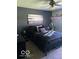 Inviting bedroom featuring soft lighting and personalized wall decor at 1425 Winding Trail Cir, Greenwood, IN 46142