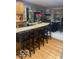 Spacious kitchen with light-colored cabinets, a large island, and an adjacent dining area at 1425 Winding Trail Cir, Greenwood, IN 46142