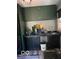 A conveniently designed laundry room with stylish dark green cabinets at 1425 Winding Trail Cir, Greenwood, IN 46142