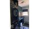 Modern laundry room with stacked appliances, sink, and functional storage at 1425 Winding Trail Cir, Greenwood, IN 46142