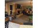 Warm living room includes a stone fireplace and comfortable seating at 1425 Winding Trail Cir, Greenwood, IN 46142