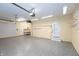 Spacious garage featuring epoxy floors, built in shelving, and plenty of storage space at 1589 Belleflower Ct, Avon, IN 46123