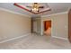 An airy main bedroom offers ensuite access, carpeted floors, and modern finishes for comfort and style at 1589 Belleflower Ct, Avon, IN 46123
