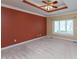 Serene primary bedroom with neutral carpeting and a large window offering natural light at 1589 Belleflower Ct, Avon, IN 46123