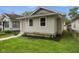 Charming home featuring fresh landscaping and a well-maintained yard at 1606 Asbury St, Indianapolis, IN 46203