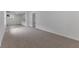 Spacious and bright room with modern updates and neutral decor at 1606 Asbury St, Indianapolis, IN 46203