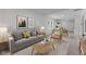 Inviting living space features stylish decor and an open layout to dining area at 1606 Asbury St, Indianapolis, IN 46203