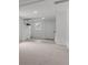 Bright room with neutral carpeting; clean, modern, and ready for personalization at 1606 Asbury St, Indianapolis, IN 46203