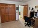 Bedroom features a closet, neutral walls and carpet, and a work station at 1711 Lafayette Ave # 7, Lebanon, IN 46052