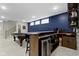 Finished basement featuring a billiard table and wet bar with barstool seating at 17359 Wilkes Way, Westfield, IN 46074
