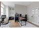 Home office or exercise room with peloton, desk, chair and natural light at 17359 Wilkes Way, Westfield, IN 46074