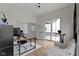 Versatile exercise room featuring an exercise bike, French doors, and easy access to the home's outdoor spaces at 17359 Wilkes Way, Westfield, IN 46074