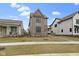 Charming two-story home featuring a manicured lawn, brick and siding exterior, and inviting curb appeal at 17359 Wilkes Way, Westfield, IN 46074