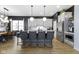 Kitchen showcasing large island with seating, modern lighting, and stainless appliances at 17359 Wilkes Way, Westfield, IN 46074
