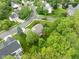 Aerial view of the home nestled in a neighborhood with mature trees and landscaping at 18278 Benton Oak Dr, Noblesville, IN 46062