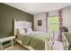 Bright bedroom with a bed, modern colors, and plenty of natural light at 18278 Benton Oak Dr, Noblesville, IN 46062